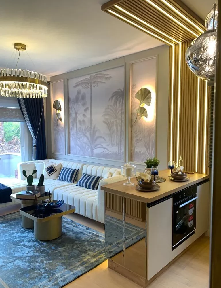 Studio apartment for sale in Mersin Kargipinari – exterior view of the residential complex with pool